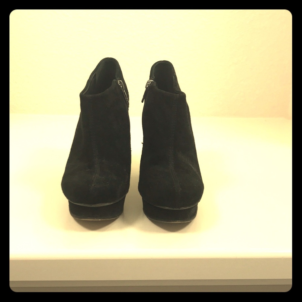 Black suede Tory Burch booties.